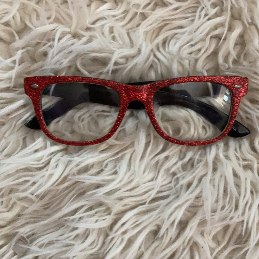 Red sparkly glasses.